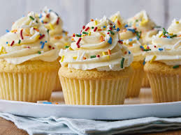 alt="colorful cupcakes listed as the best bakery items"