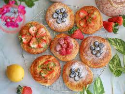 Fruit-topped Danish pastry showcasing the beauty of luxury pastries