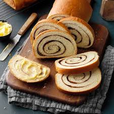 alt="Cinnamon Swirl Bread – soft and sweet breakfast loaf listed in the best bakery items